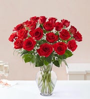 Two Dozen Roses in a Glass Vase