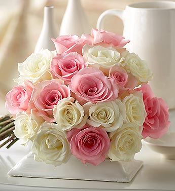 18 stems of pink and white roses