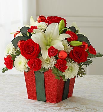 carnations, roses, lilies in gift box container